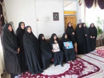 دیدارریاست و جمعی از کارکنان آموزشکده ملی مهارت دختران میبد با خانواده شهیدمحمد حسین محمدی
 8