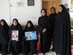 دیدارریاست و جمعی از کارکنان آموزشکده ملی مهارت دختران میبد با خانواده شهیدمحمد حسین محمدی
 13