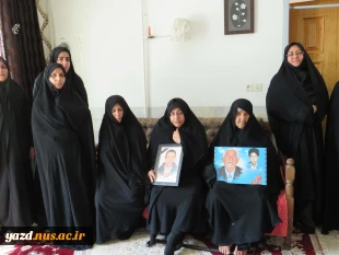 دیدارریاست و جمعی از کارکنان آموزشکده ملی مهارت دختران میبد با خانواده شهیدمحمد حسین محمدی
 5