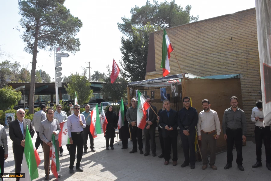 آغاز سال تحصیلی جدید  در دانشکده شهید صدوقی با حضور مسئولان، استادان و دانشجویان همراه با پرچم گردانی 4